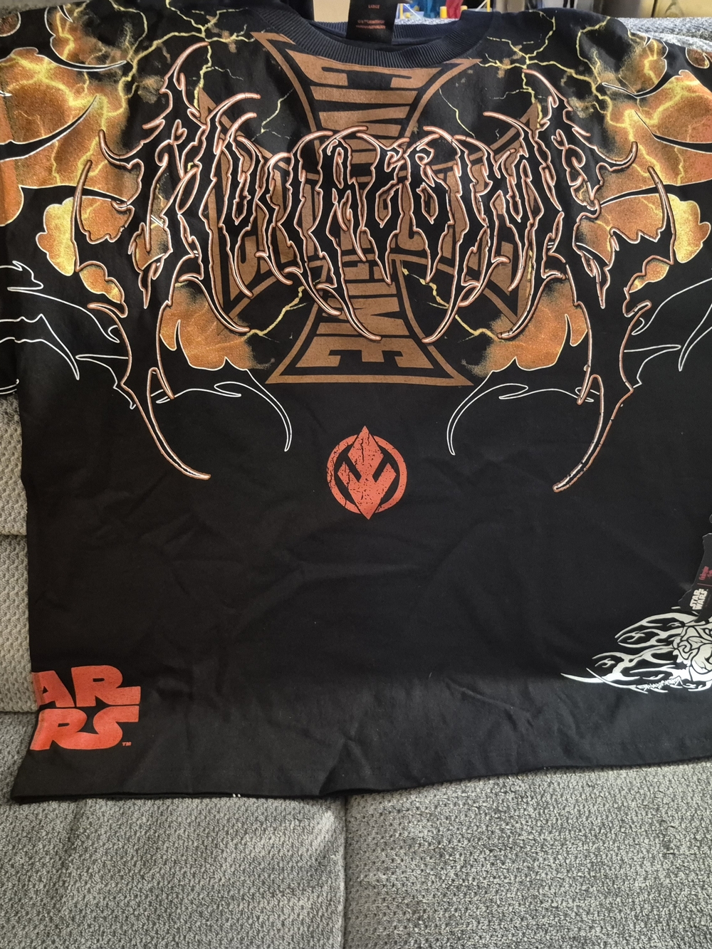 Star Wars Black Tee with Orange and Gold Lightning Graphic